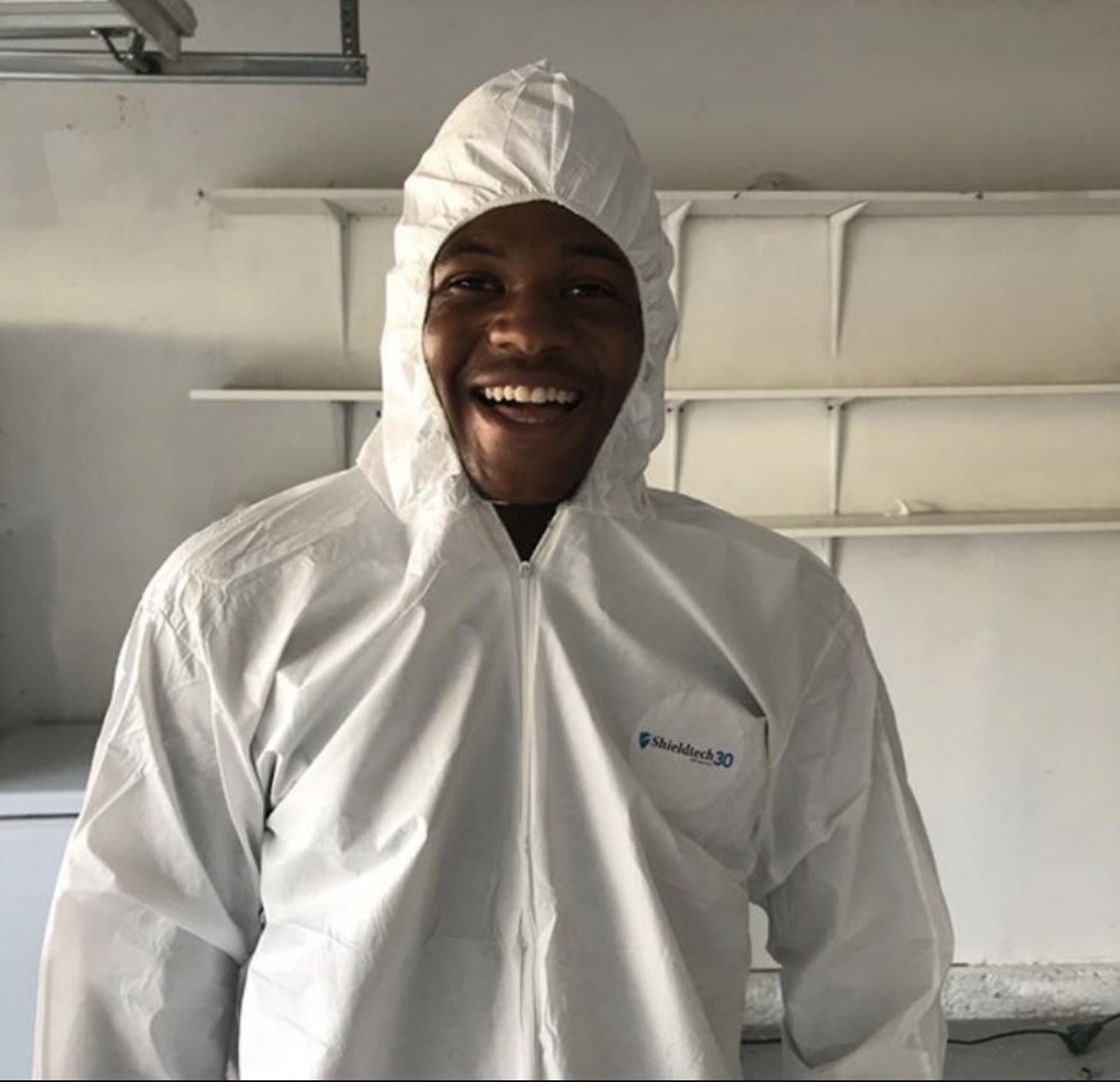 Odor Removal Services Denver technician suited up and ready for an odor remediation job in Denver.