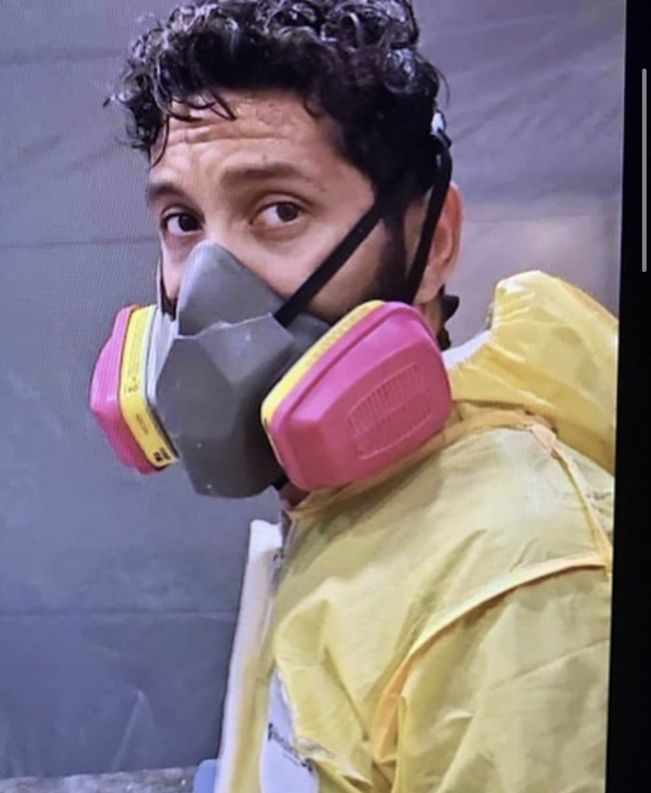 Respirator-equipped Odor Removal Services Denver crew member during a deep odor decontamination treatment.